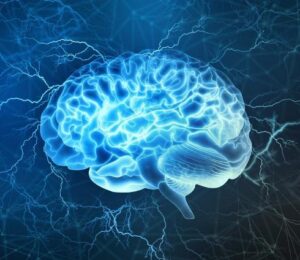 A glowing blue digital illustration of a human brain with electric currents and lightning bolts surrounding it, set against a dark abstract background.
