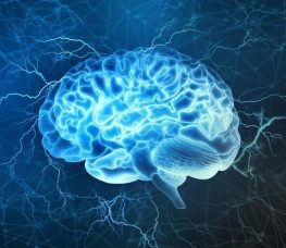 A glowing blue digital illustration of a human brain with electric currents and lightning bolts surrounding it, set against a dark abstract background.